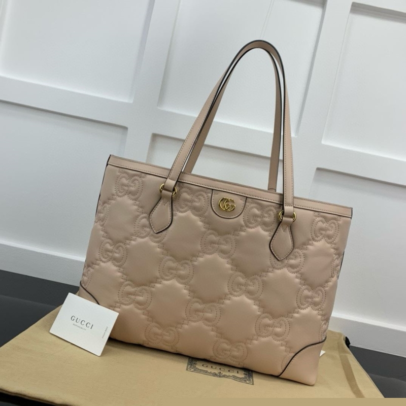 G*u*i shopping bags